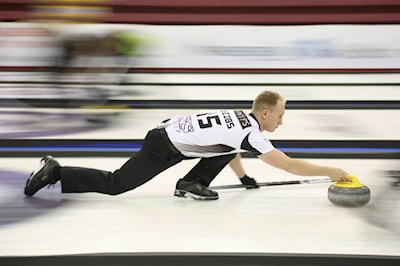 Skip Brad Jacobs throws the rock during a draw against Team Epping at the National on November 21, 2014 at the Essar Centre.