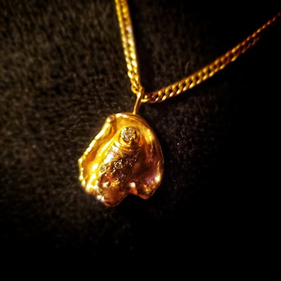 My Grandparents wedding rings were melted down to make a pendant