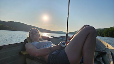Jan sunbathing. If you can't u can't catch a fish you might as well catch the sun.