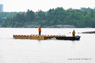Dock section being towed to the site.