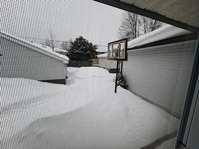 Large snowbanks in the backyard of a home on the north end of North Bay. 