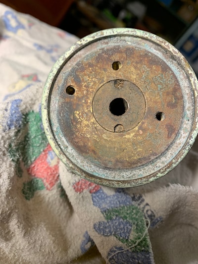 The bottom of the casing with some maker's marks