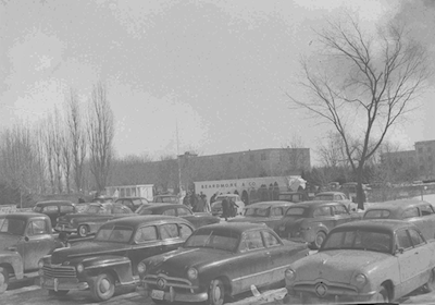 The gates and parking lot at the Beardmore Tannery -- 1954 Photo Credit: Dills Collection