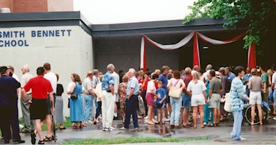 Pictured, is a group of alumni waiting to enter the former high school on Acton Blvd -- June 24th, 2000 Photo Credit: The New Tanner Archives Collection