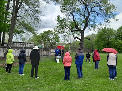 Vintage Acton's Scott Brooks provided a historic tour of the Acton Pioneer Cemetery on May 25th. Photo Credit: John Brooks