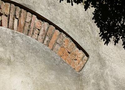 Uncovering the old arch, much more interesting than the current finish 